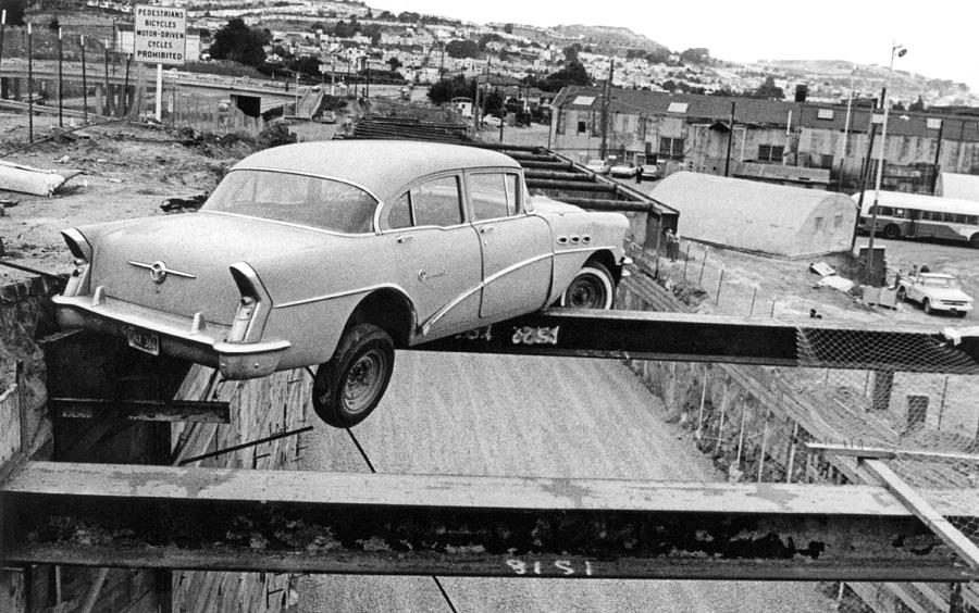A Car Precariously Balanced Photograph by Underwood Archives