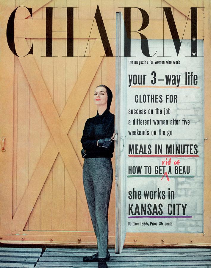 A Charm Cover Of A Model Opening A Door Photograph by Carmen Schiavone