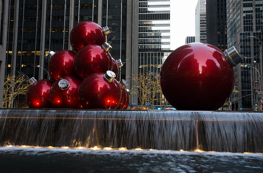 A Christmas Card from New York City - Manhattan Skyline Reflecting in Giant Red Balls Photograph by Georgia Mizuleva