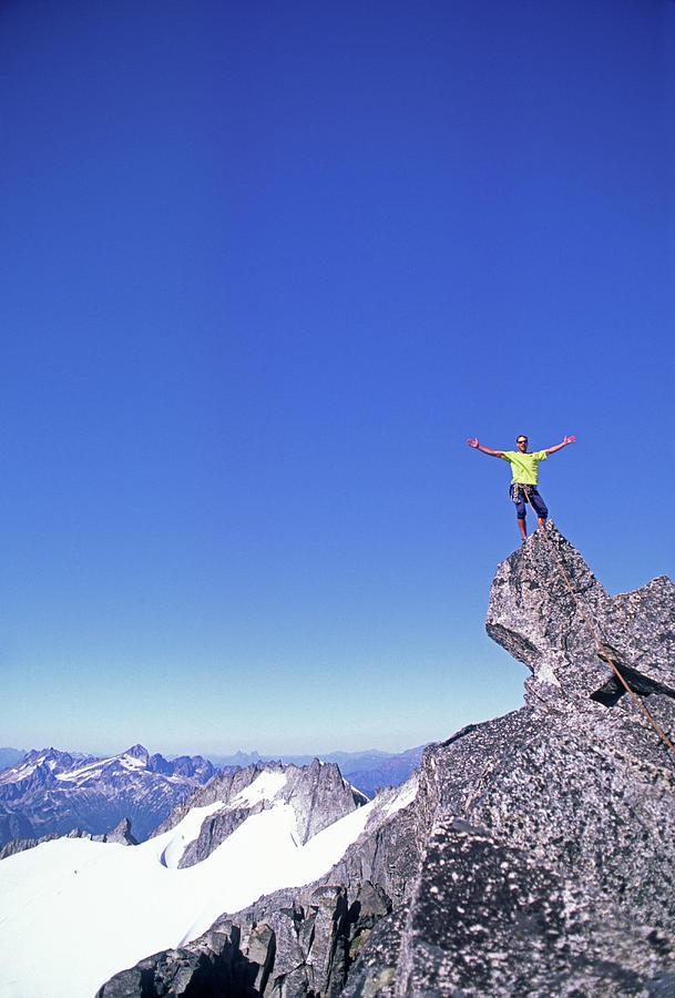 A Climber Celebrates At The Summit Photograph By Cliff Leight - Pixels