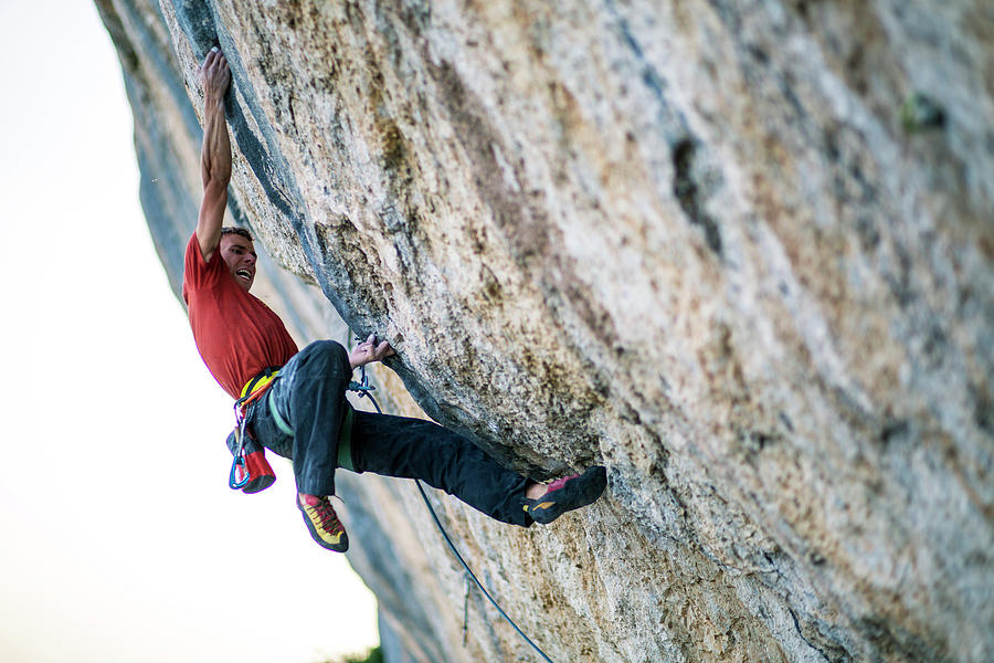 A Climber Tries Hard On A Cliff Photograph by Cameron Maier - Fine Art ...