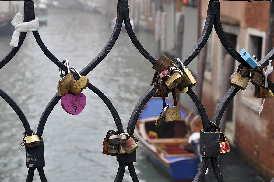 A Closer Look Of The Padlocks Connected To The Railing Of The