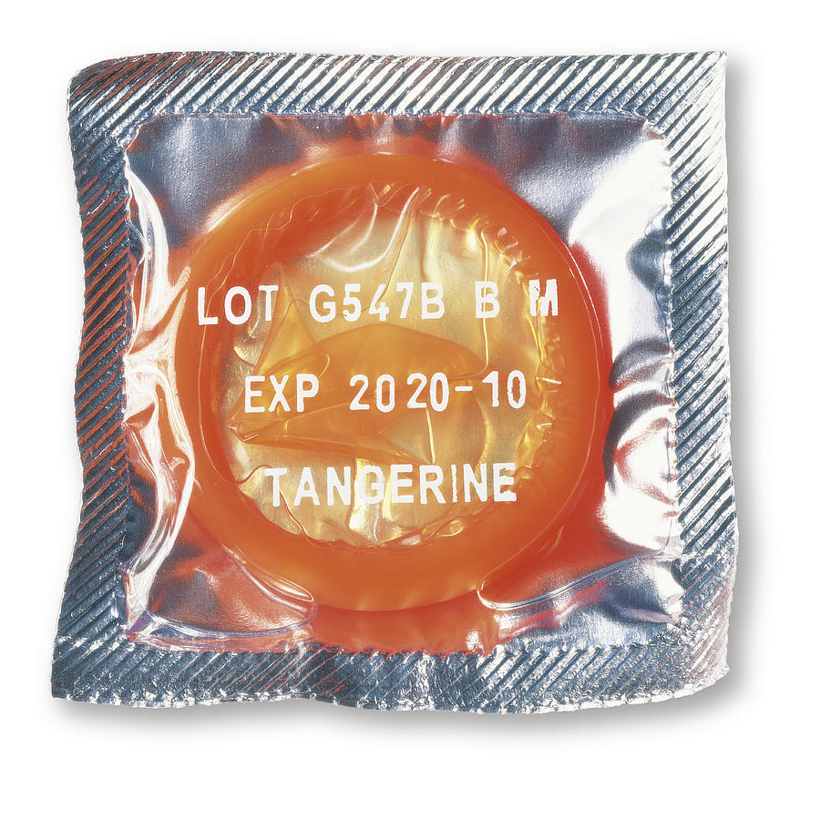 A Condom in a Packet Photograph by Ian McKinnell