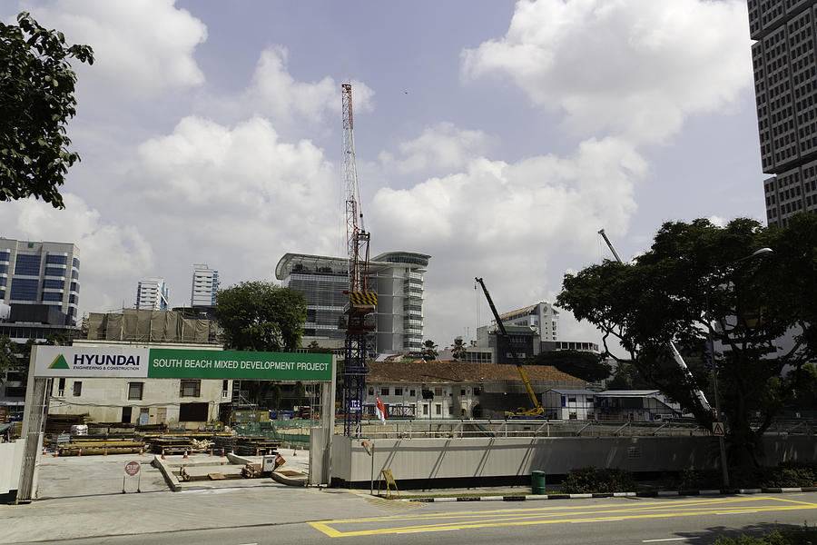 A construction site in Singapore with cranes and a lot of work Photograph by Ashish Agarwal