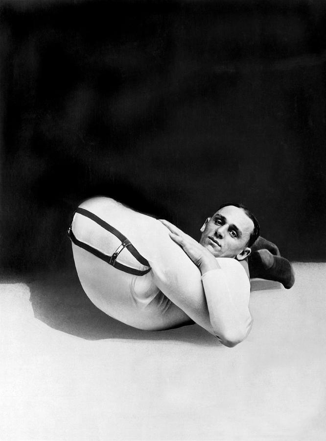 Black And White Photograph - A Contortionist by Underwood Archives