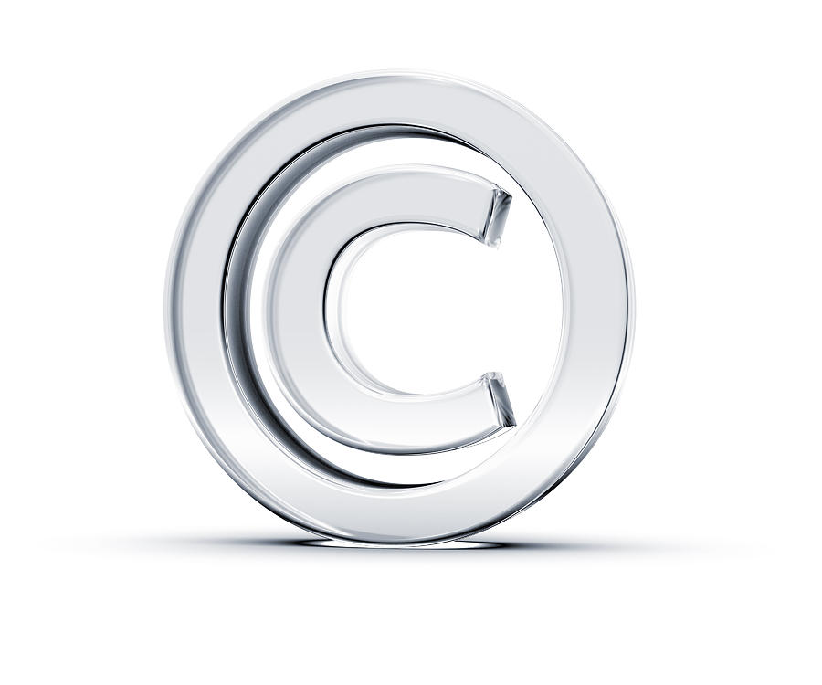 A copyright symbol in 3D on a white background Photograph by Hometowncd