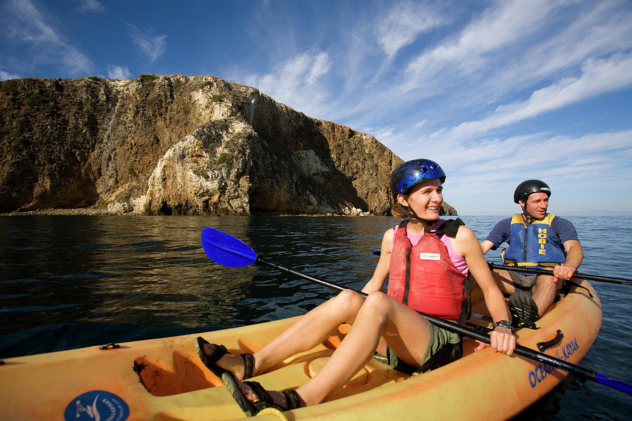 Channel Islands National Park Photograph - A Couple Sea Kayaks Along The Shores by Lisa Seaman
