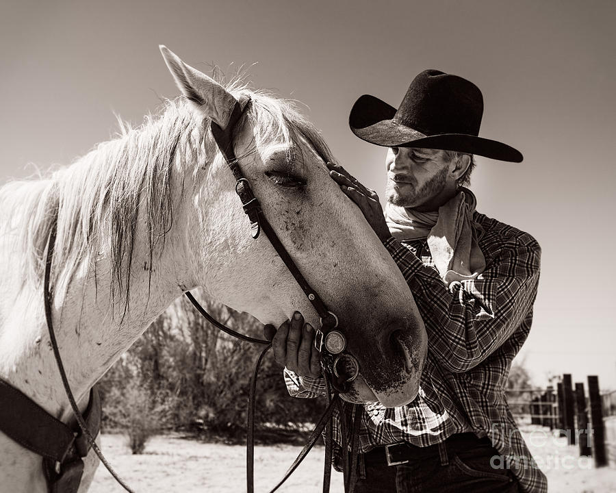 A Cowboy Needs A Good Horse Photograph by Royce Howland