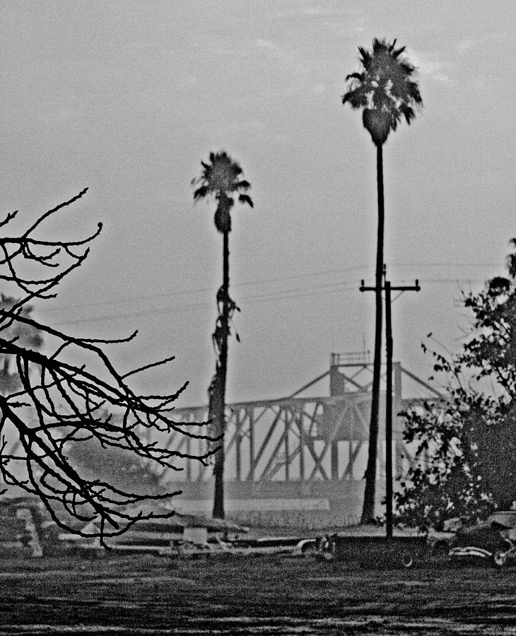 a Delta drawbridge in the morning mist Photograph by Joseph Coulombe