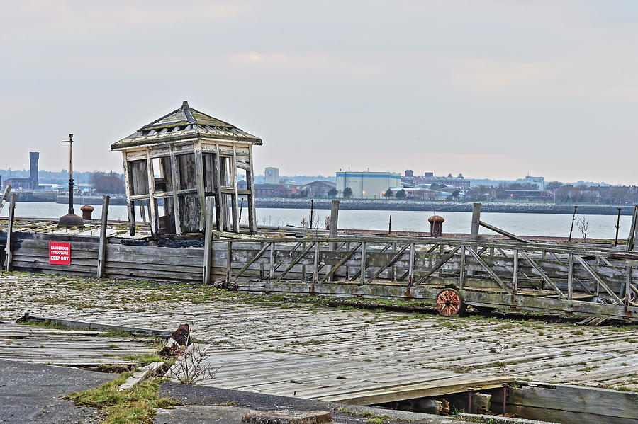 A derelict kiosk on a disused quay in Liverpool Photograph by Tony Mills