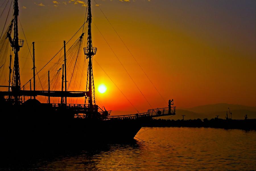 A digitally converted painting of a ship in silhouette at sunset Mixed ...