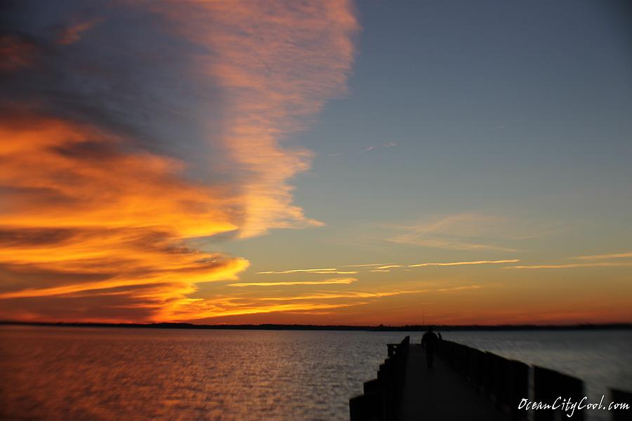 A Dock Walking Sunset Photograph by Robert Banach