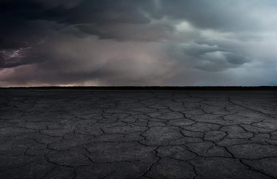 A dry lakebed landscape under the lightning bolts ,Auto advertising background Photograph by Xuanyu Han