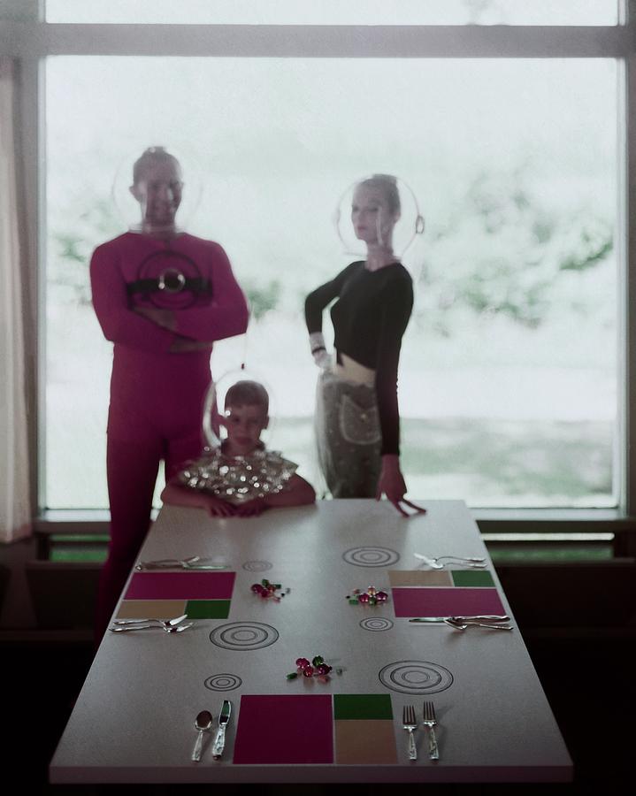 A Family Posing By A Dining Table Photograph by Otto Maya