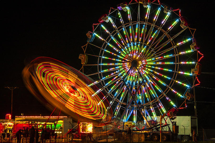 Colorful Carnival Ferris Wheel Ride At Night Photograph
