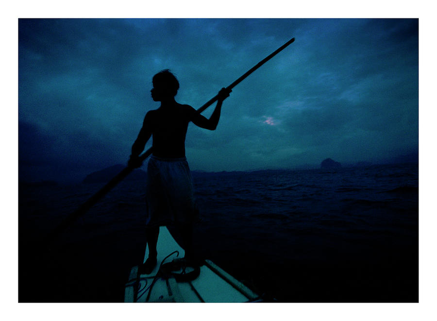 Fish Photograph - A Fisherman Travels Home On Sunset by Simon Odwyer Aurora Photo Agenc