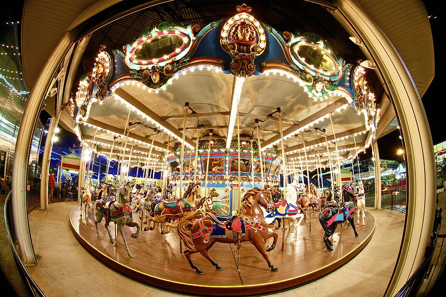 A fisheye view of a Merry Go Round Photograph by John Babis
