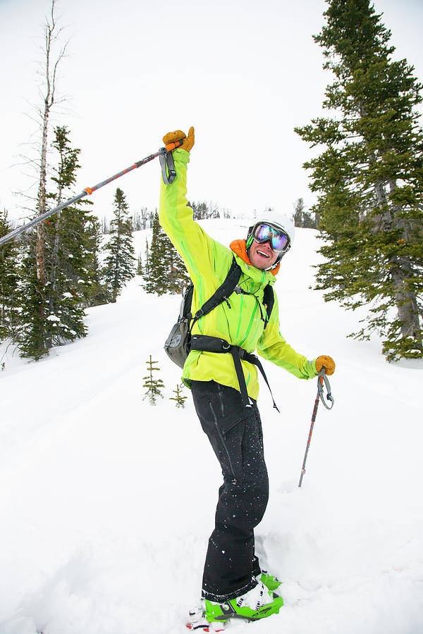 A Fit Male Skier With A Backpack Photograph by Craig Moore - Fine Art ...