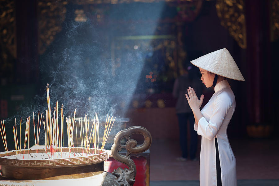 A Girl In Ao Dai Praying In A Pagoda Photograph by Jethuynh