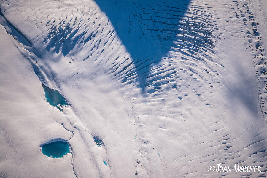 A glacier shadow Photograph by Joan Wallner