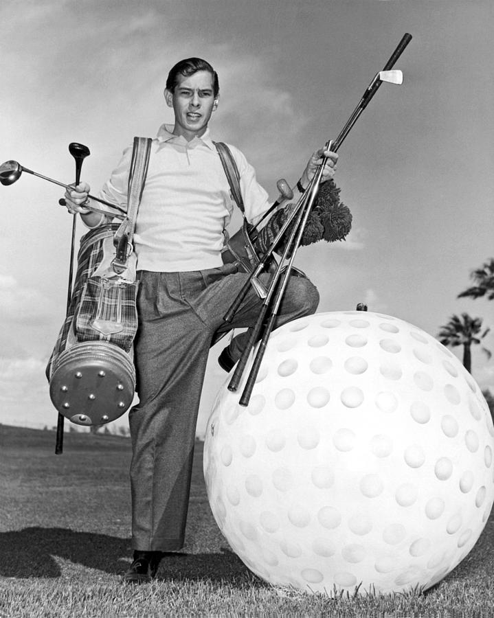 A Golfer With A Giant Ball Photograph by Underwood Archives