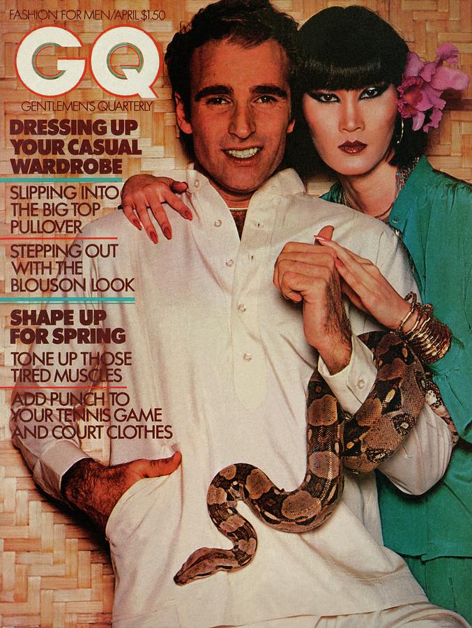 A Gq Cover Of A Couple With A Snake Photograph by Albert Watson