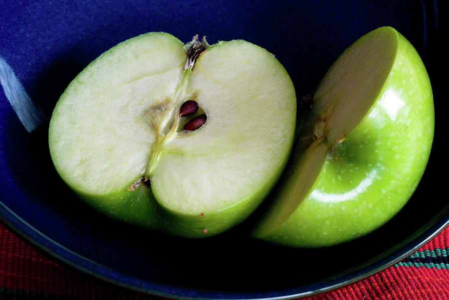 A Green Apple Cut In Half In A Blue Bowl Photograph by Rebecca E Marvil