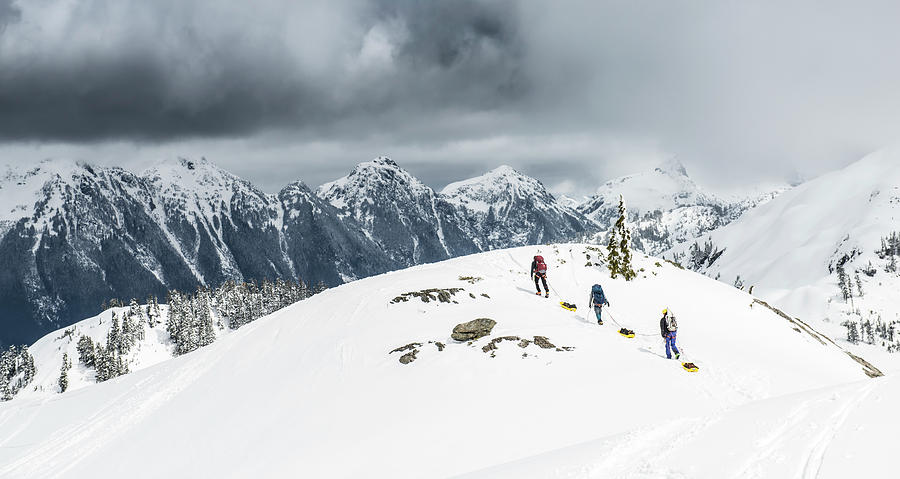 A Group Of Climbers Drag Sleds Of Gear Photograph By Alasdair Turner Fine Art America 7701