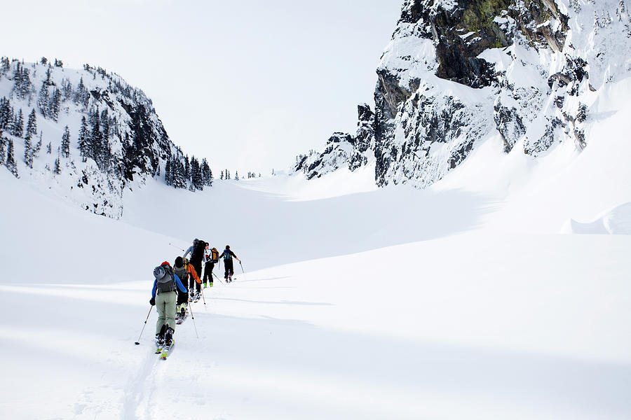 Adult Photograph - A Group Of Skiers In The Backcountry by Michael Hanson Adult Photograph - A Group Of Skiers In The Backcountry by Michael Hanson