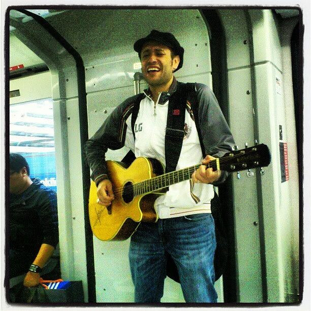 Ctrain Photograph - A Guy Playing The Guitar And Singing On by Jar Robertson