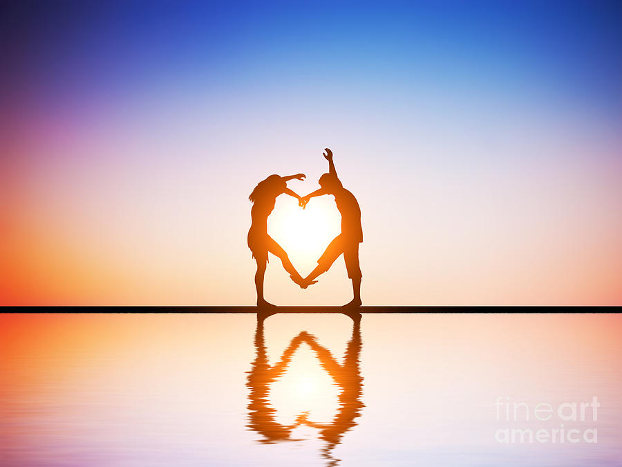Sunset Photograph - A happy couple in love making a heart shape with their bodies at sunset by Michal Bednarek