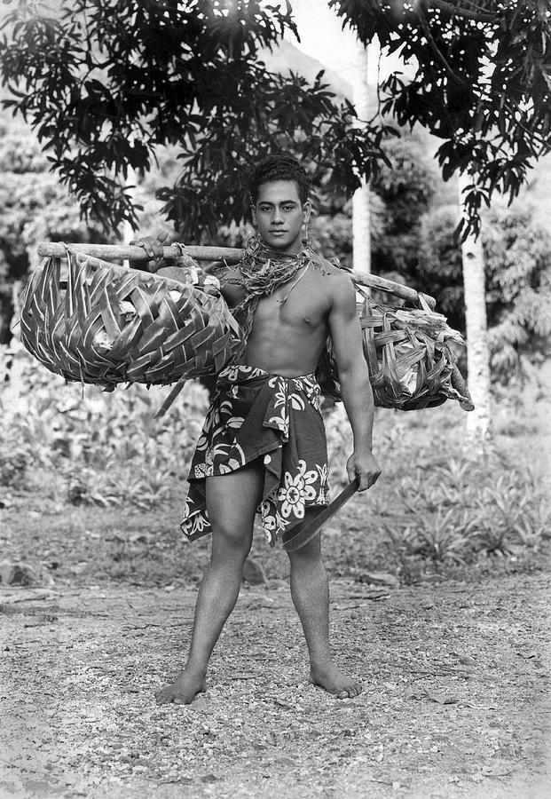 A Hawaiian With Coconuts Photograph by Underwood Archives