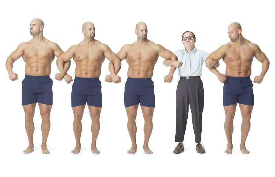 A Human Chain Of Strong Bodybuilders Temporarily Interrupted By The Body Of A Small Nerdy Man Photograph by Photodisc