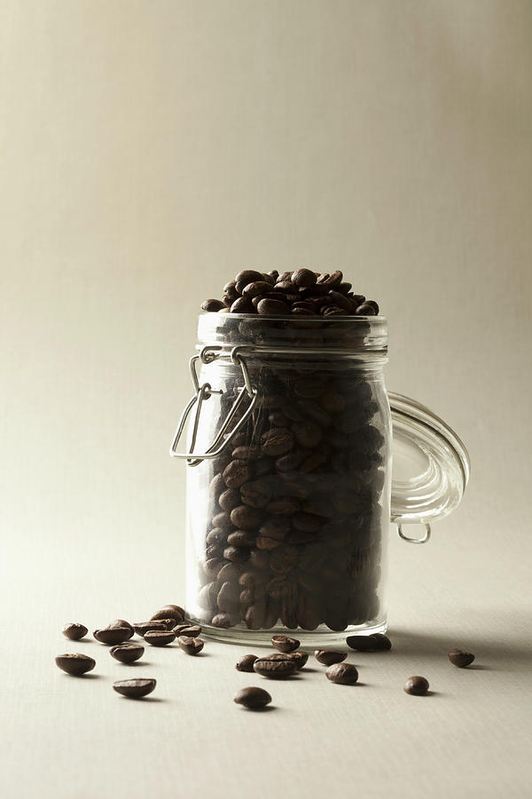 A Jar Of Coffee Beans Photograph by Larry Washburn