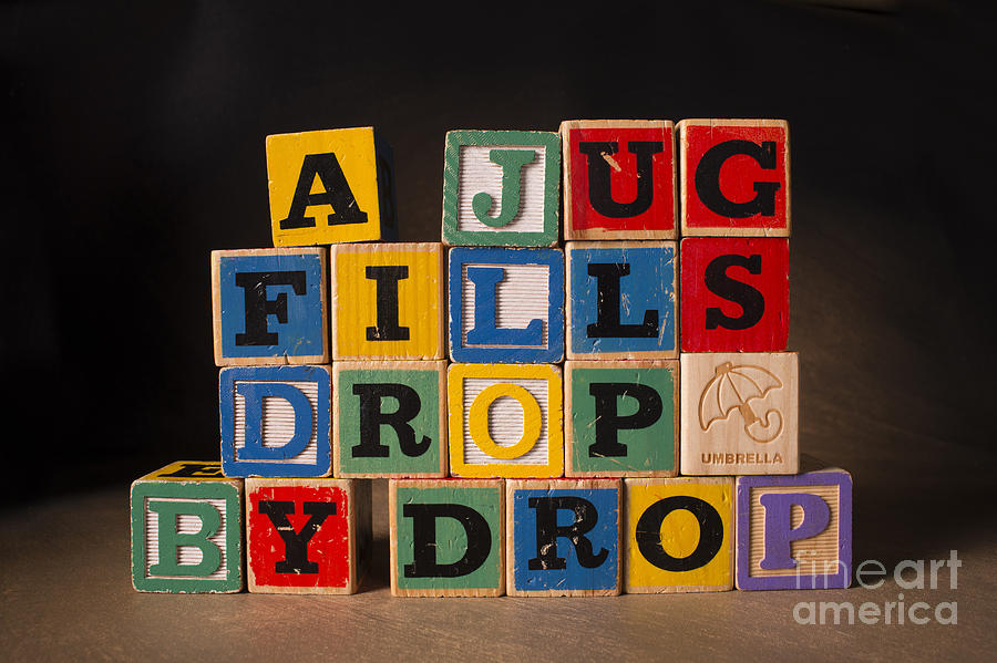 A Jug Fills Drop by Drop Photograph by Art Whitton
