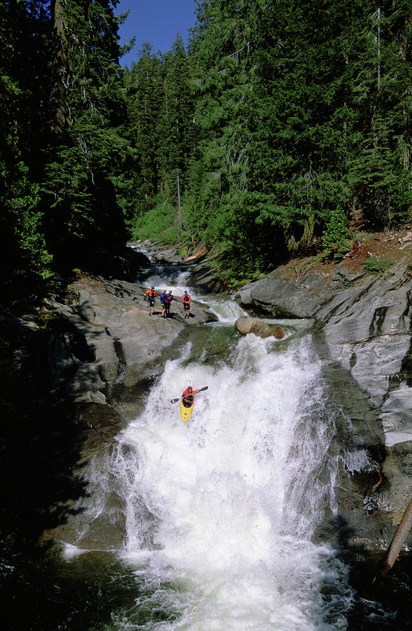 Waterfall Photograph - A Kayaker Runs A Steep Waterfall by Charlie Munsey
