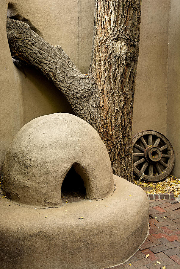 A Kiva a Tree and a Wheel Photograph by Robert Meyers-Lussier