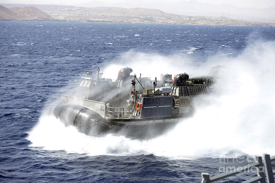 Transportation Photograph - A Landing Craft Air Cushion Conducts by Stocktrek Images