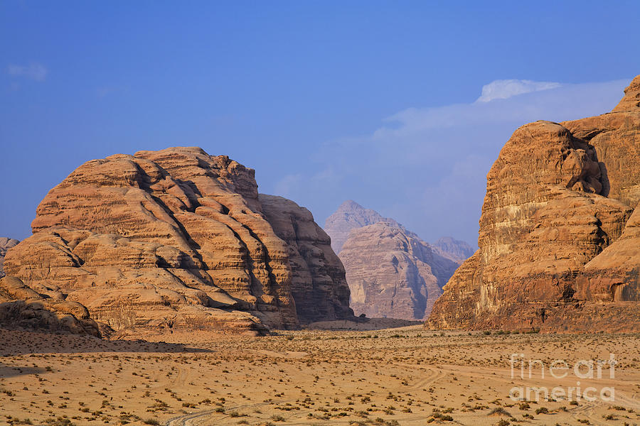 Desert Photograph - A landscape of rocky outcrops in the desert of Wadi Rum in Jordan by Robert Preston