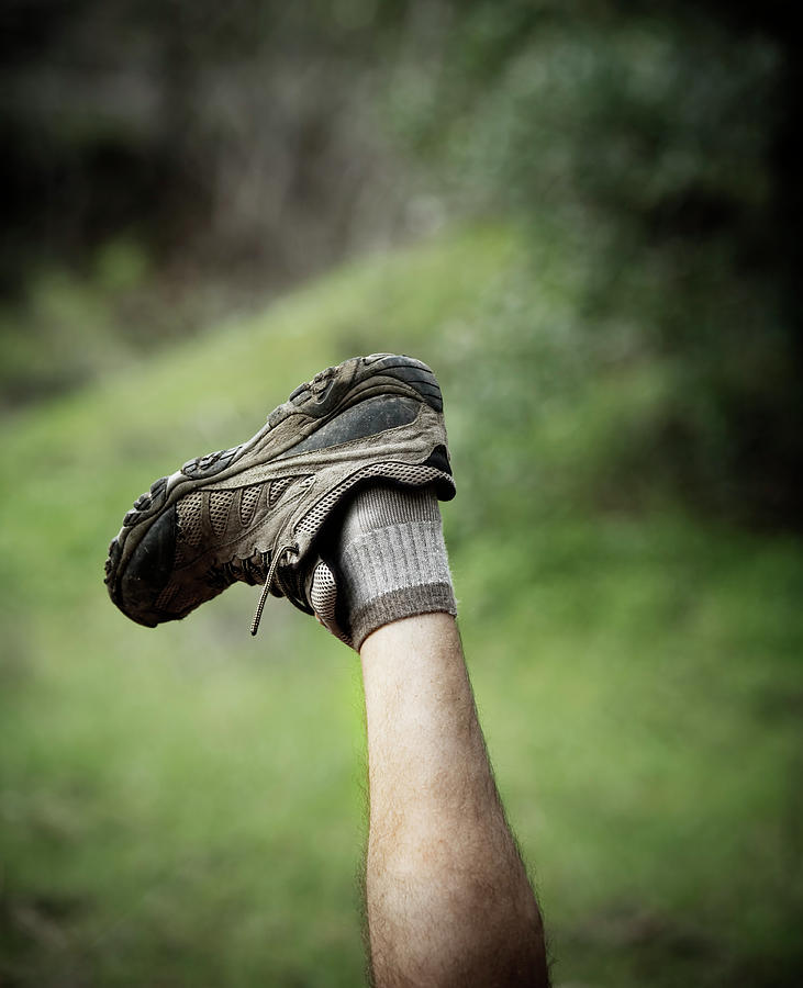 A Leg And Hiking Shoe In The Air Photograph by Ron Koeberer - Fine Art ...