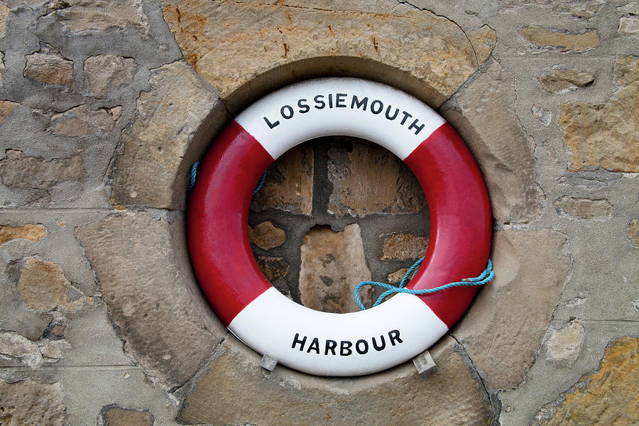 A Lifebelt At Lossiemouth Harbour Photograph by Diane Macdonald