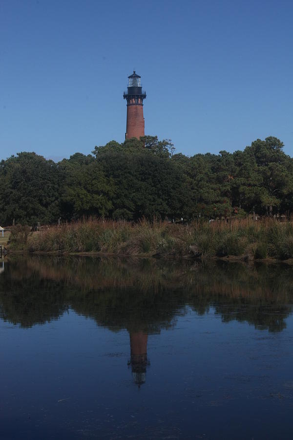 Nature Photograph - A lighthouse reflection by Darlene Neisess