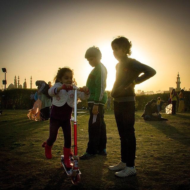 Egypt Photograph - A Little Girl Stepping Around Her by Mattias Pruym