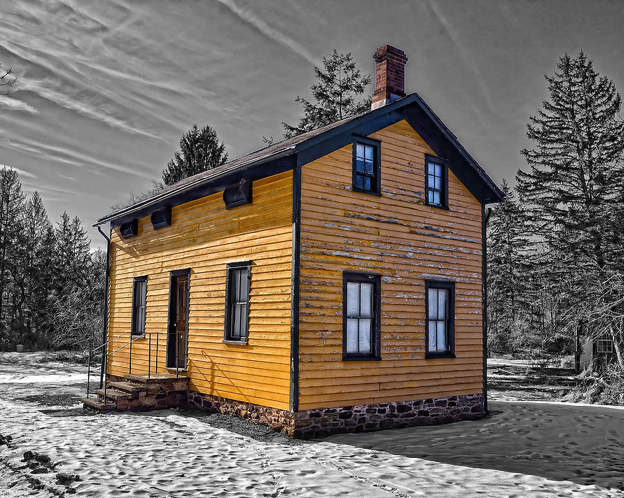 A little touch of color on this yellow farm house. Photograph by Dave Sandt