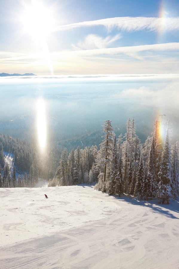 A Lone Skier Makes A Turn On Snowy Photograph by Craig Moore