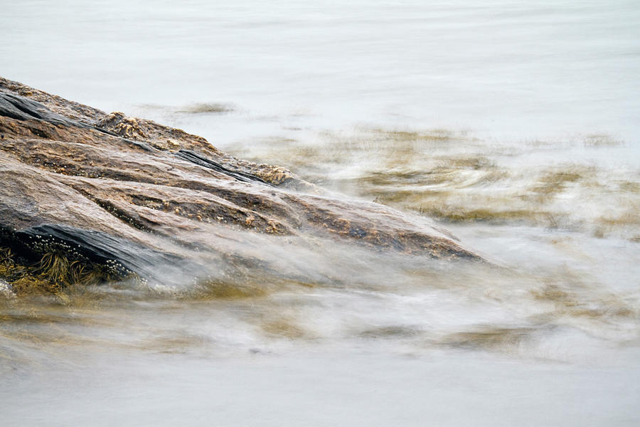 A Long Exposure Of Waves Crashing Along Photograph by Chris Bennett