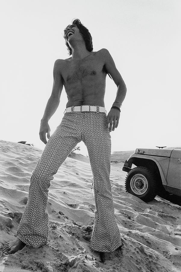A Male Model On A Beach Photograph by Mark Patiky