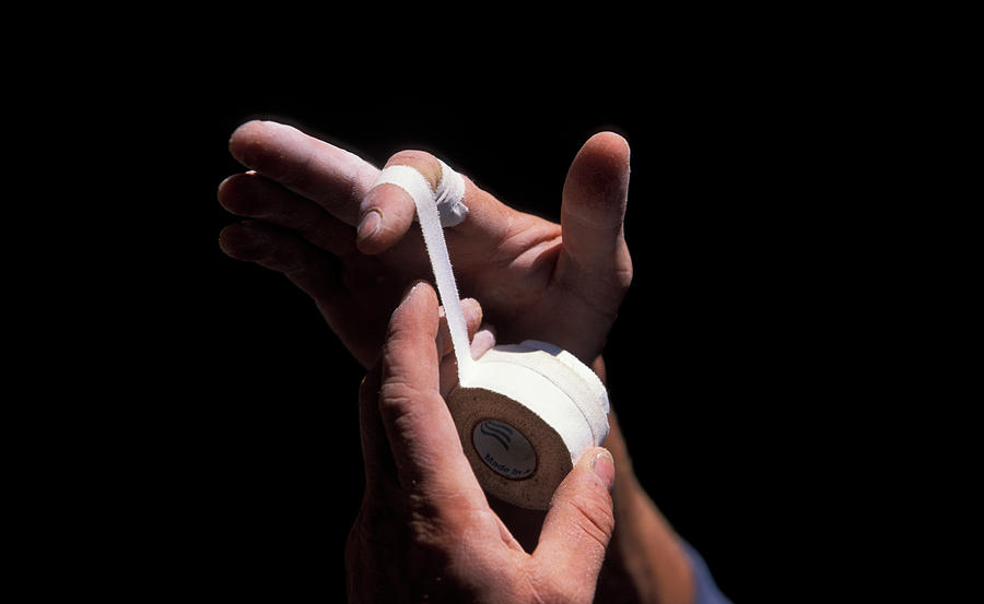 A Male Rock Climbers Hands Being Tapes Photograph By Corey Rich Fine Art America