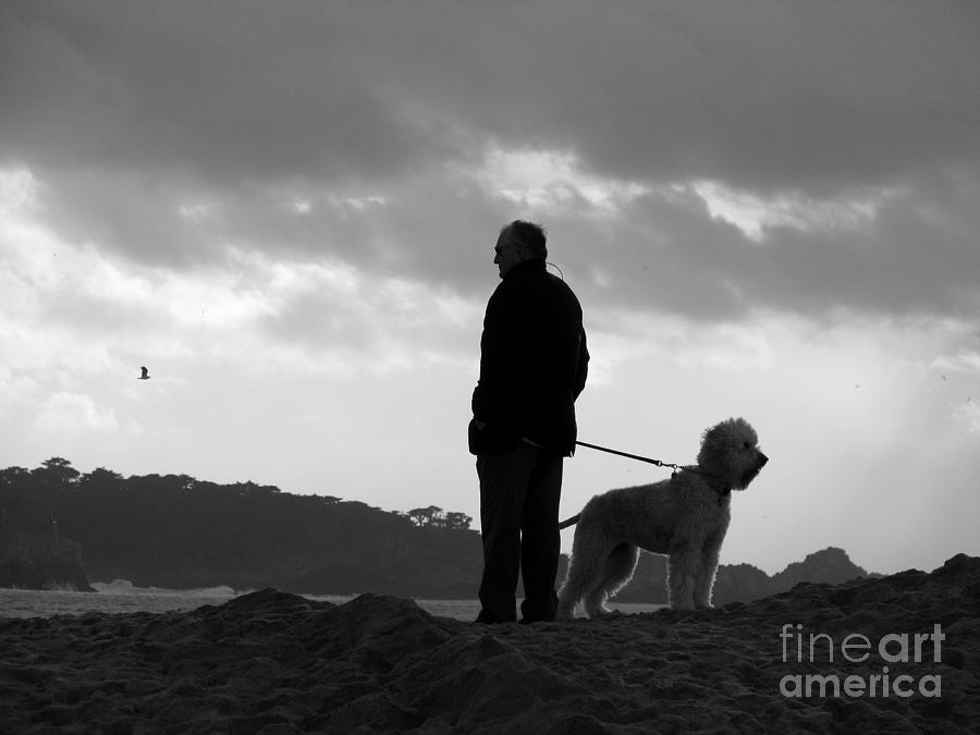 A Man A Dog And A Storm Photograph by James B Toy