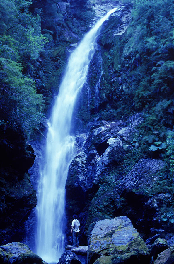 A Man Admires A Waterfall, Patagonia Photograph by Lars Howlett | Fine ...